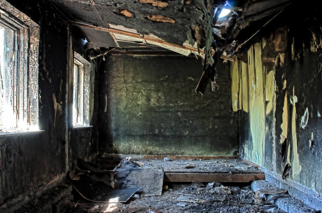 burnt house after a fire that took the life of a young Sarasota girl