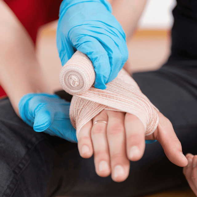 a person's hand wrapped in a bandage